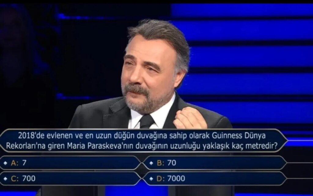 “2018’de evlenen ve en uzun düğün duvağına sahip olarak Guinness Dünya Rekorları’na giren Maria Paraskeva’nın duvağının uzunluğu yaklaşık kaç metredir